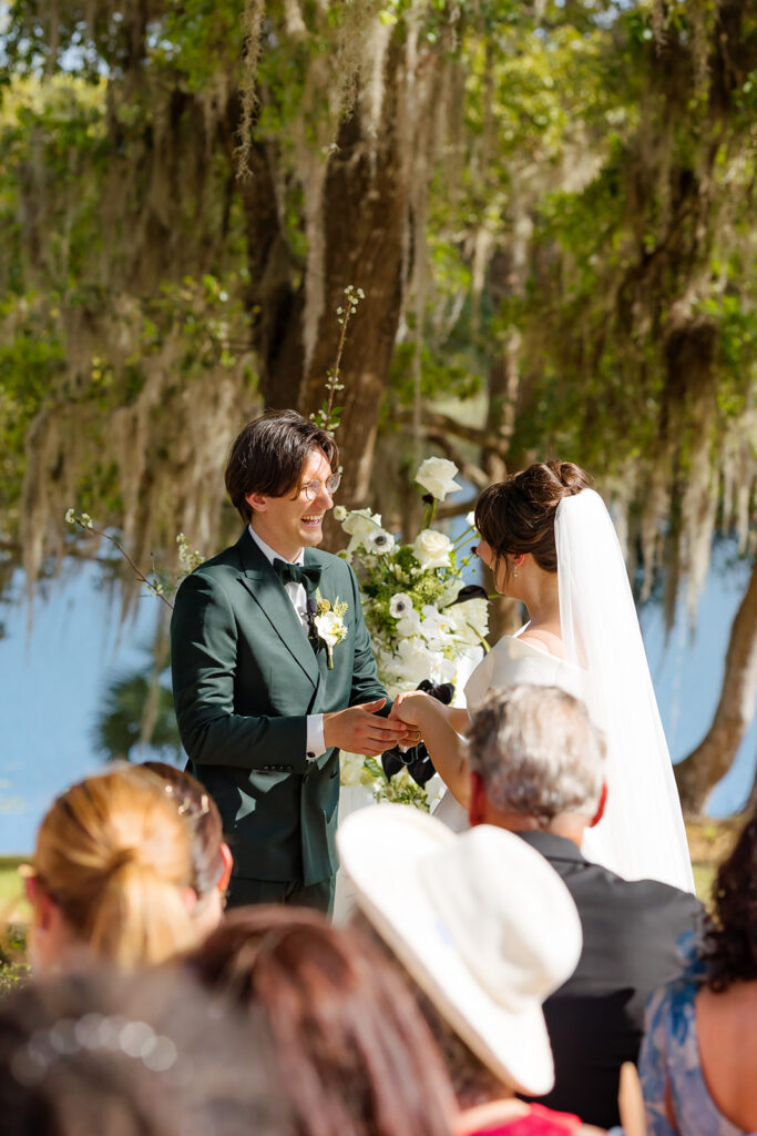 reading wedding vows during a wedding ceremony at Sydonie Mansion